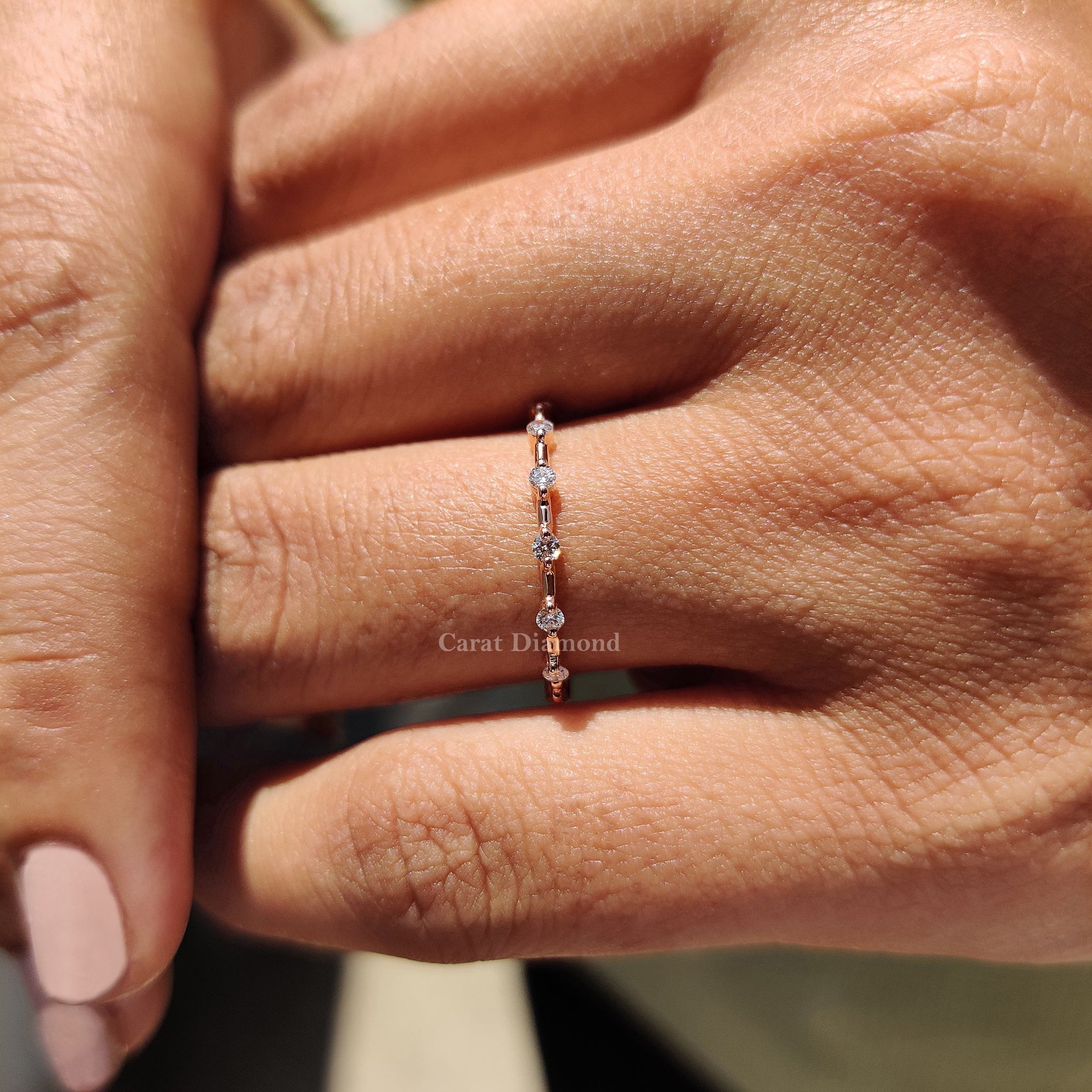 Wedding band stack in rose gold.