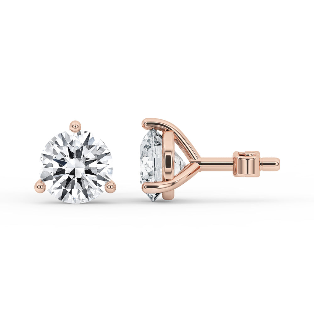 Martini stud earrings with 1-carat diamonds in a minimalist design.