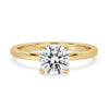 Round brilliant cut diamond ring set in a stunning 4-prong design, perfect for engagements.