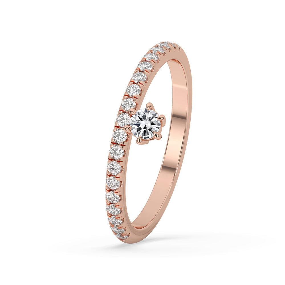 Rose gold pave ring with round cut diamond and 6 prong claw setting, perfect for special occasions.