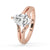 Pear shaped diamond ring crafted in elegant rose gold design.
