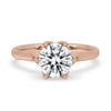 Round diamond solitaire engagement ring with timeless elegance.