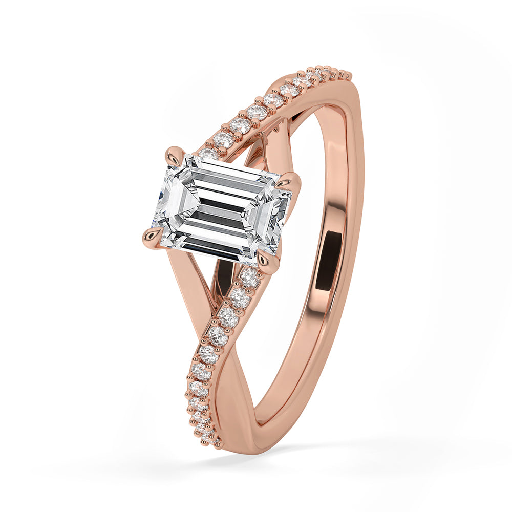 Emerald cut diamond ring crafted with pave diamonds, combining modern design and ethical luxury.