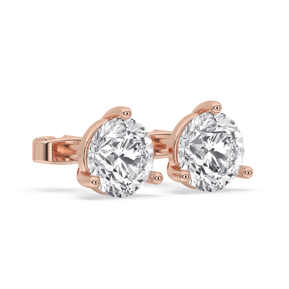 Martini setting earrings featuring round diamond studs for elegance.