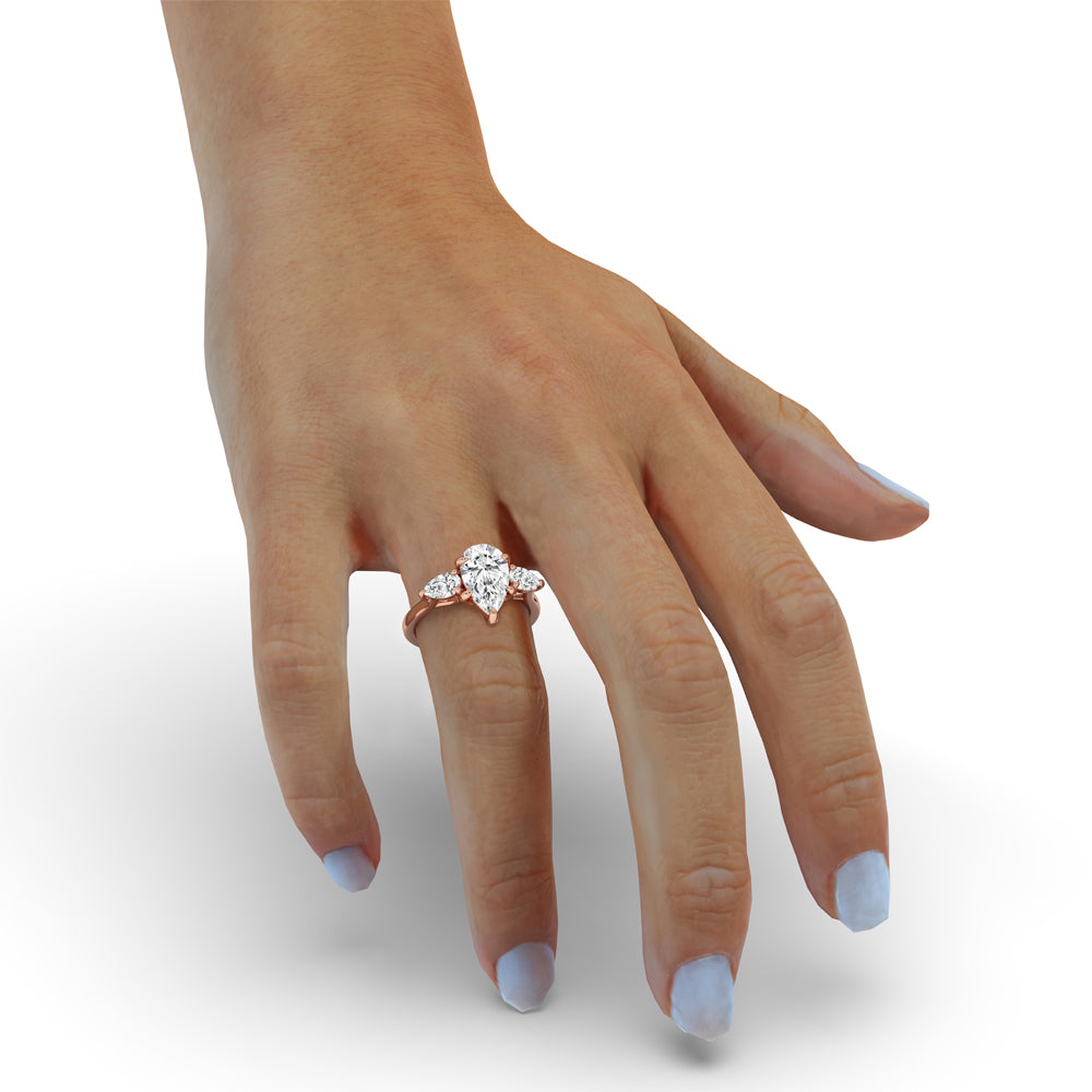 Classic pear diamond ring in a claw prong setting.
