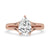 Split shank engagement ring with a stunning pear diamond centerpiece.
