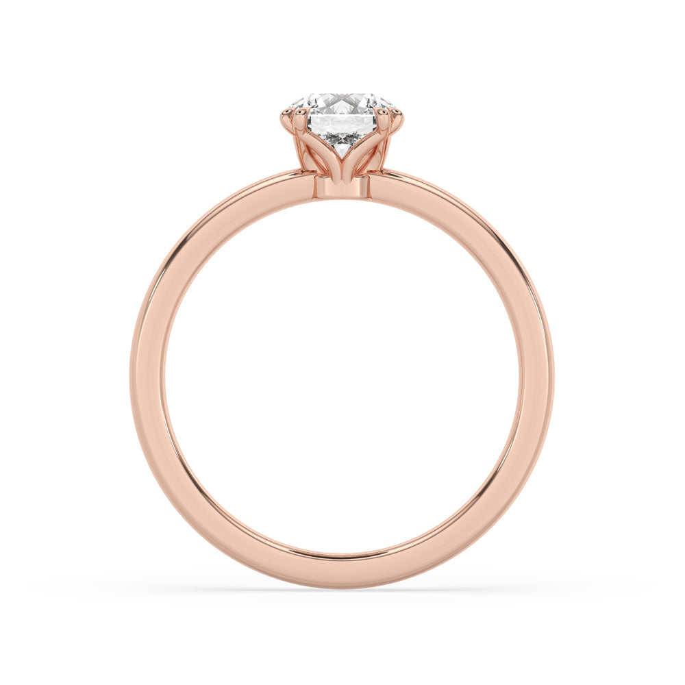 Round Shaped Diamond Solitaire Engagement Ring In Rose Gold