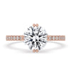 Claw prong setting showcasing a stunning round diamond for a classic yet secure design.
