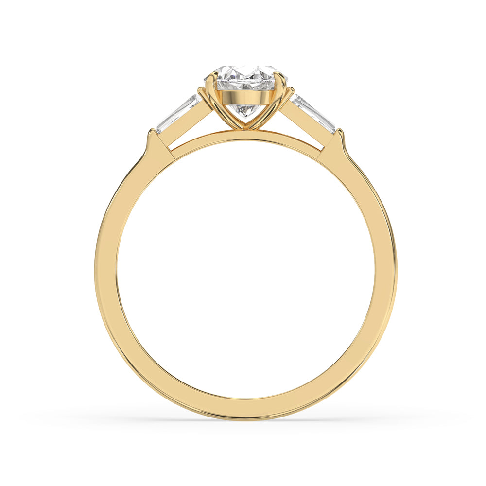 Oval engagement ring featuring a stunning oval diamond and 2 side stone tapered baguettes in a classic design.
