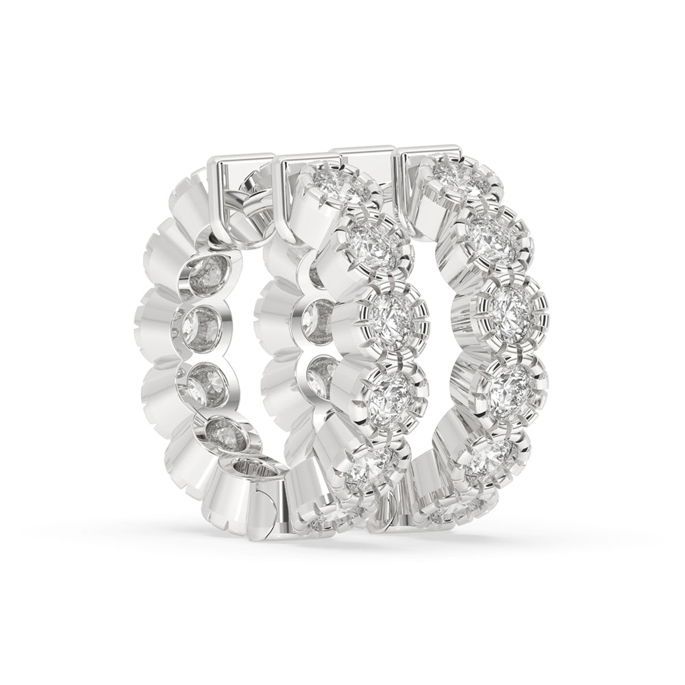 Hoop earrings for women crafted with bezel set diamond earrings, showcasing a perfect mix of modern style and luxury.
