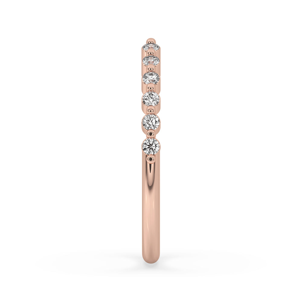 Rose gold wedding band with a sleek and stylish finish.