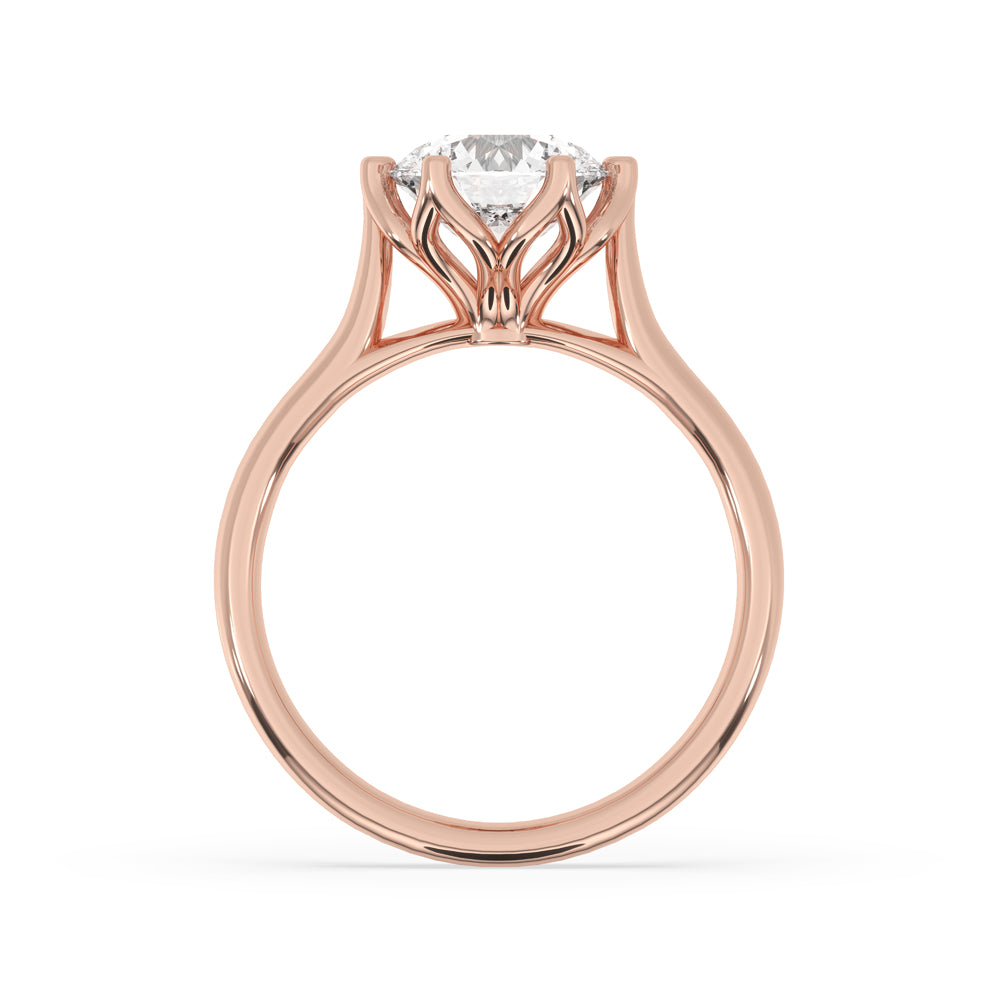 Cathedral ring setting with a round diamond for a classic look.