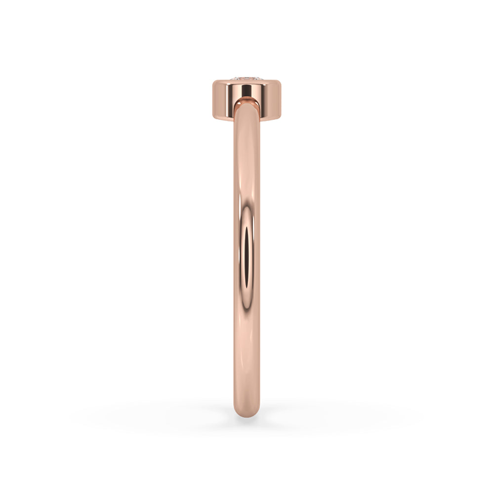 Simple engagement ring in a bezel set rose gold ring design, crafted with igi certified Lab Grown Diamonds.