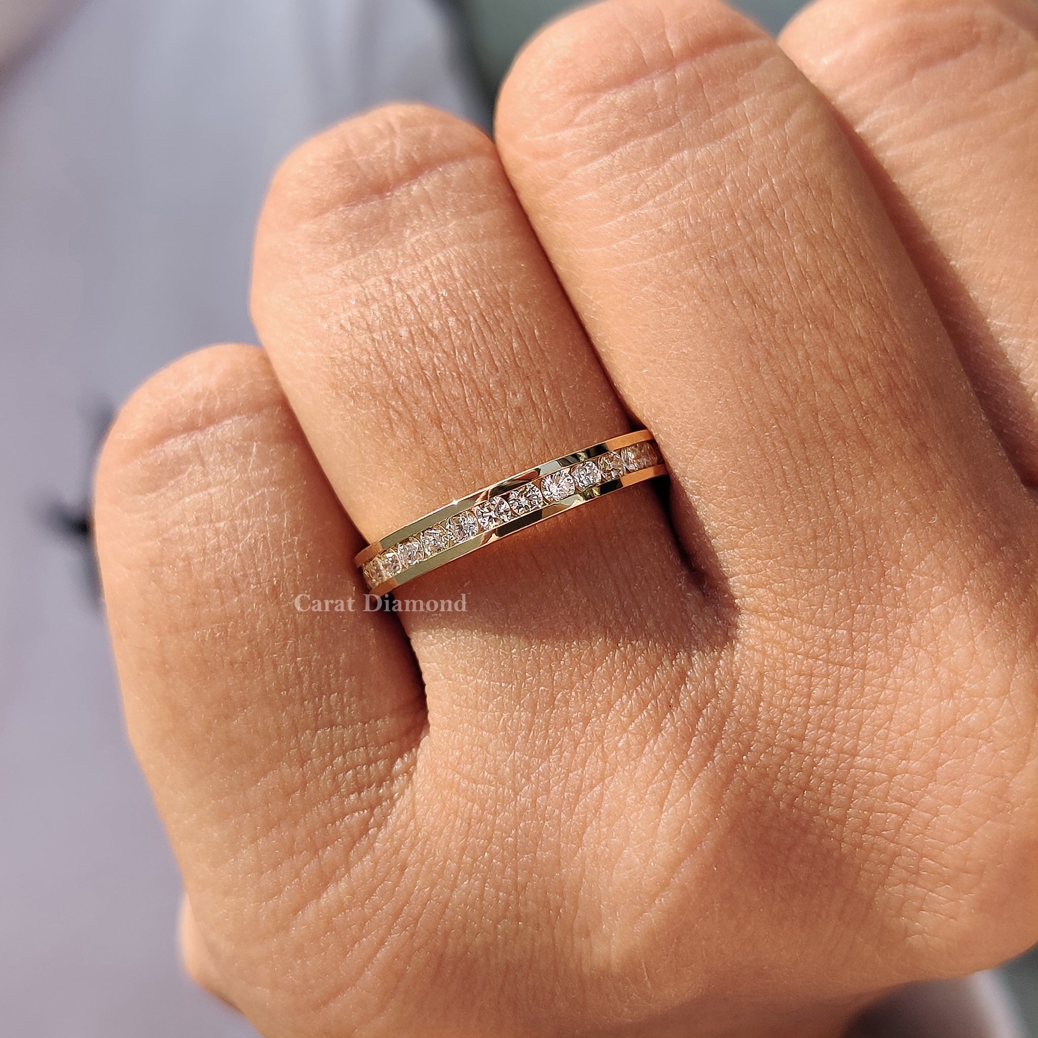 Channel wedding band with a Lab Grown Diamond for eco-friendly luxury.
