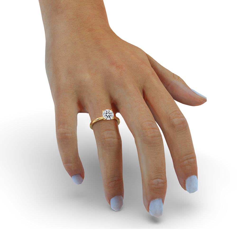 Diamond solitaire ring round in a handmade band with 2 carat diamonds, ideal for engagements.