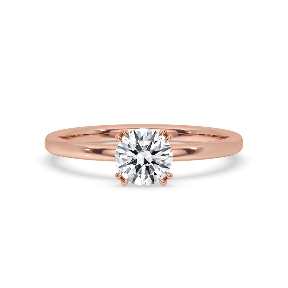 Round Shaped Diamond Solitaire Engagement Ring In Rose Gold