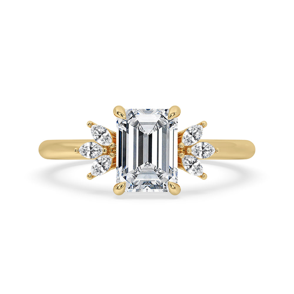 Emerald cut diamond ring featuring claw prongs and 4 claw prong settings for secure and elegant craftsmanship.
