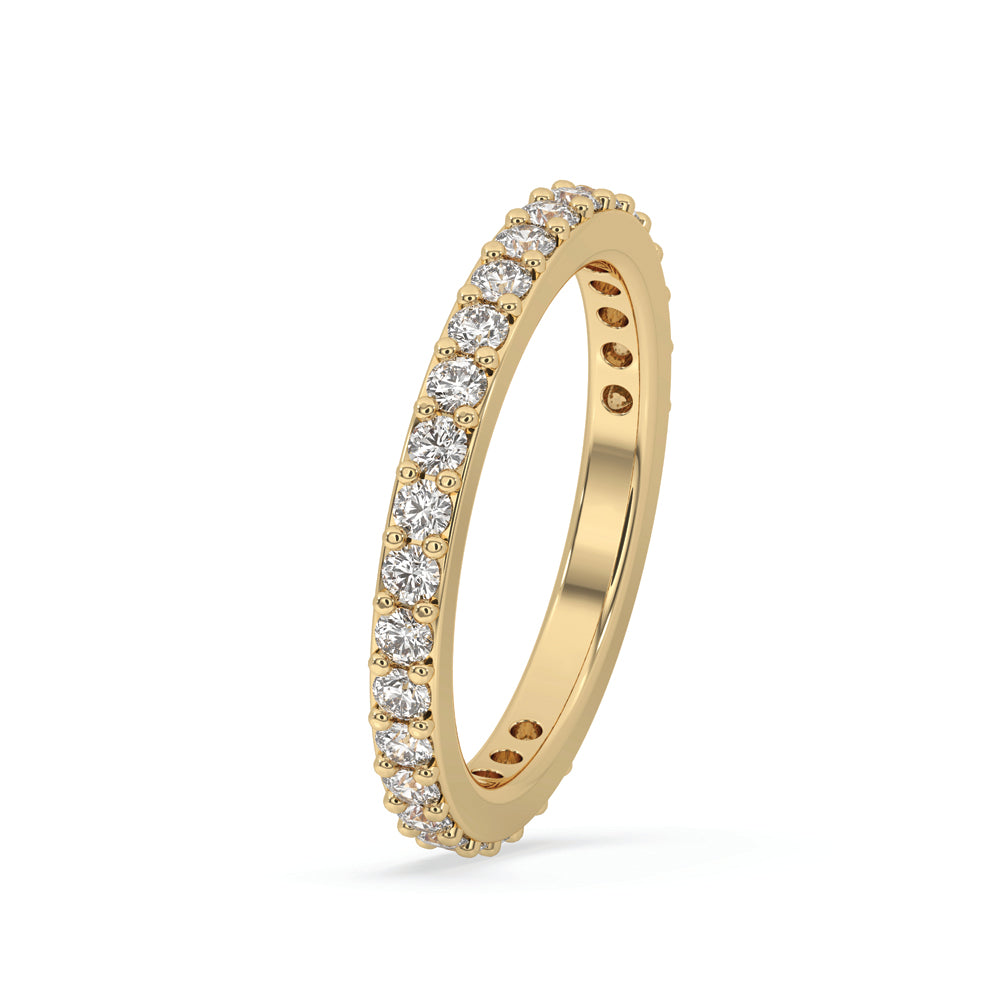 Dazzling half eternity wedding band with intricate details.
