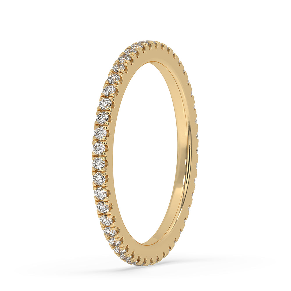 Round diamond wedding band set in a beautiful yellow gold band for elegance.
