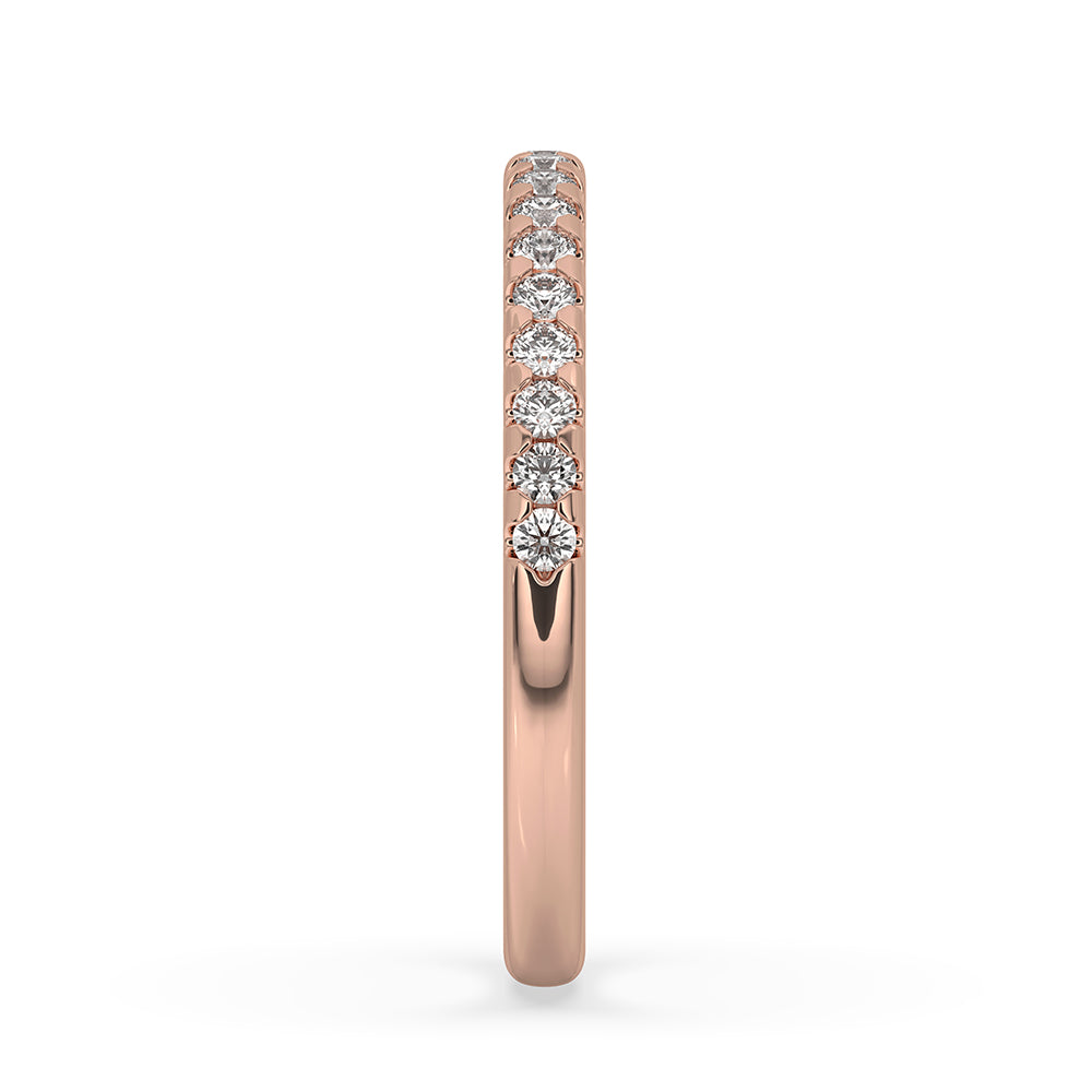 Bezel set eternity band featuring a round diamond eternity band.
