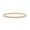 Elegant gold tennis bracelet with a timeless design, perfect for everyday wear and special occasions.
