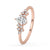 Rose gold pear shaped engagement ring featuring a handmade ring design with exquisite pear diamond ring with side stones.