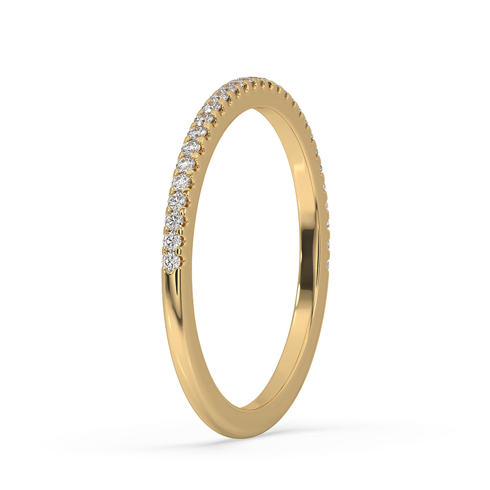 Yellow gold wedding band featuring a half eternity band design.
