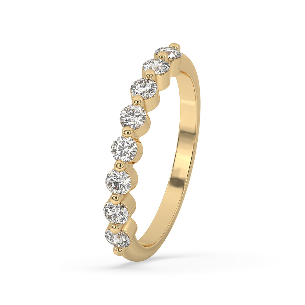 Old mine cut diamond band set in a classic yellow gold wedding band.