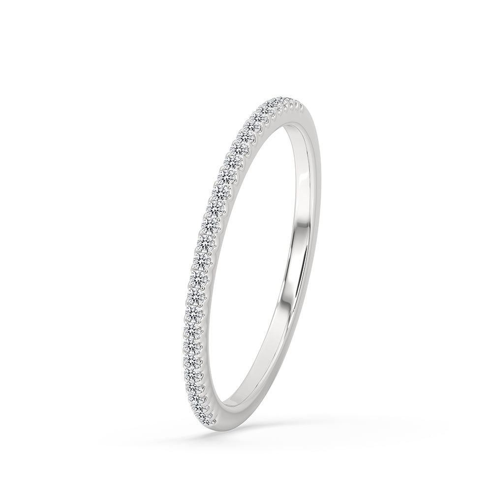 Round diamond wedding band featuring a classic half eternity band style.
