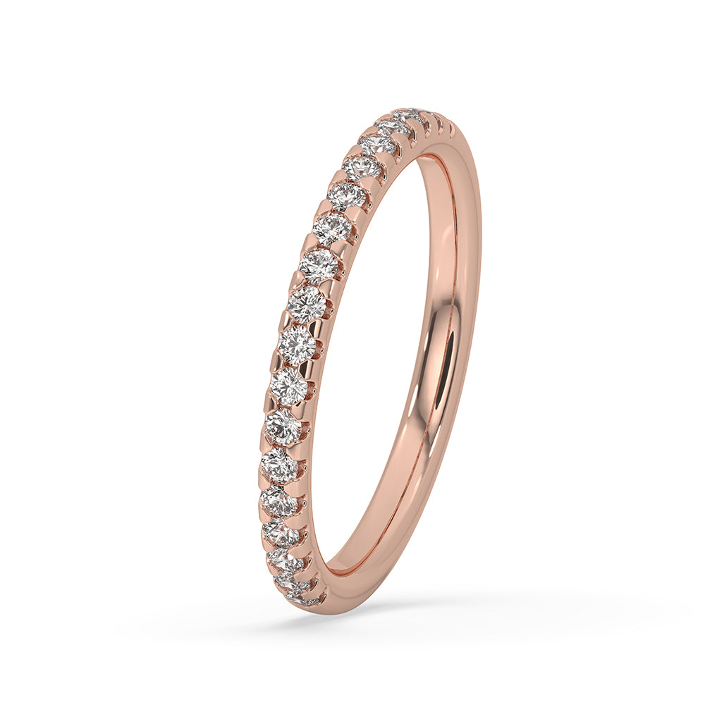 Bezel set wedding band designed with a round diamond eternity band.