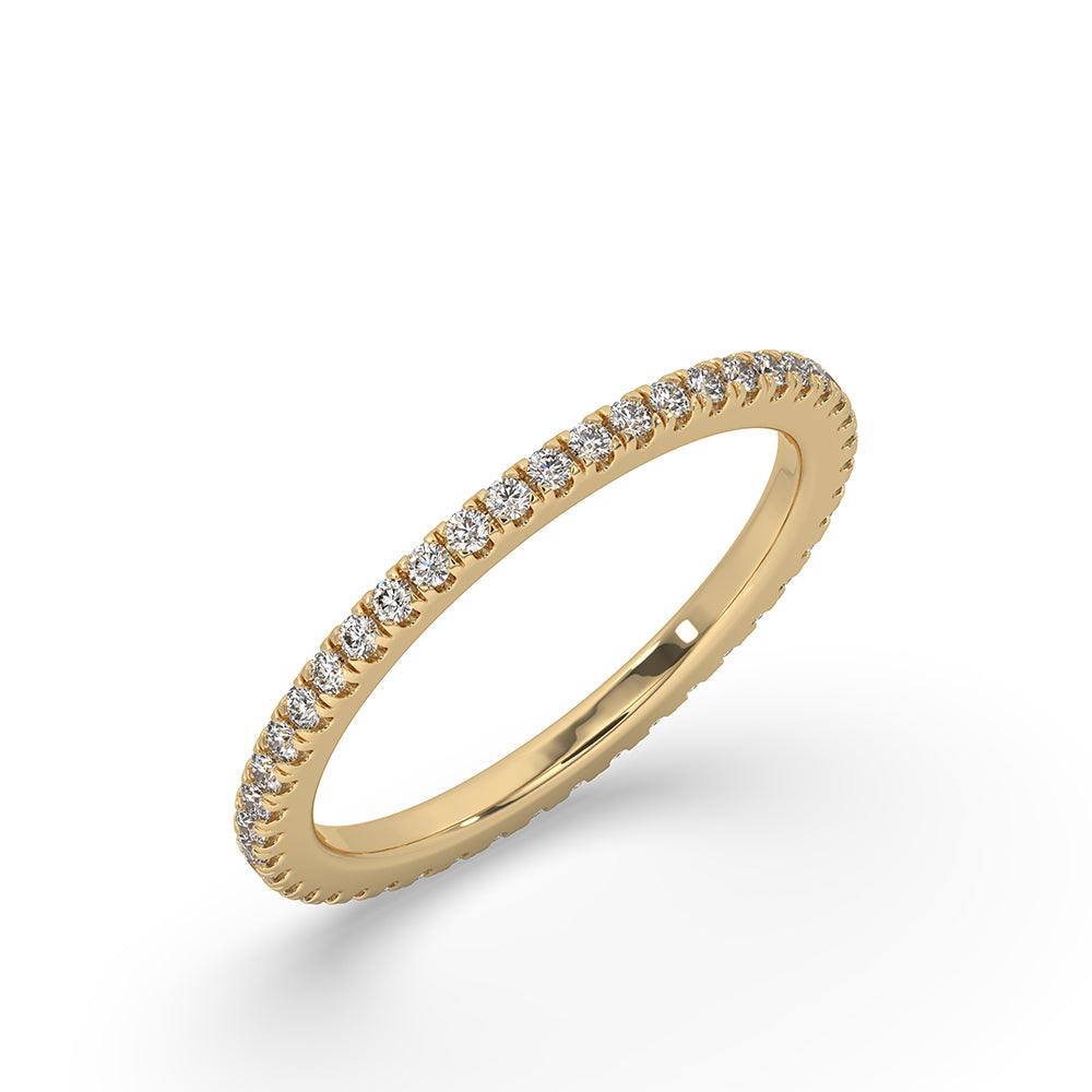 Full eternity band featuring round diamonds set in a yellow gold band.
