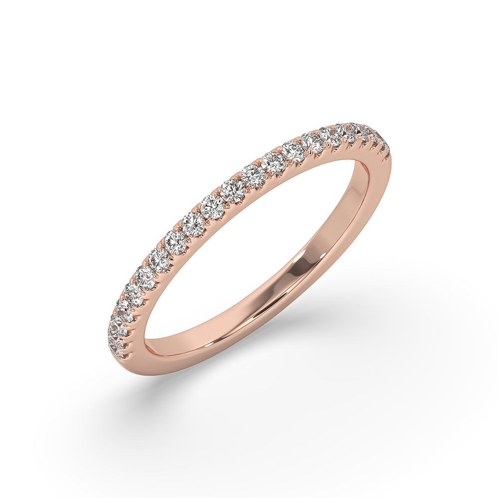 Round diamond eternity band set in a luxurious half eternity wedding band.