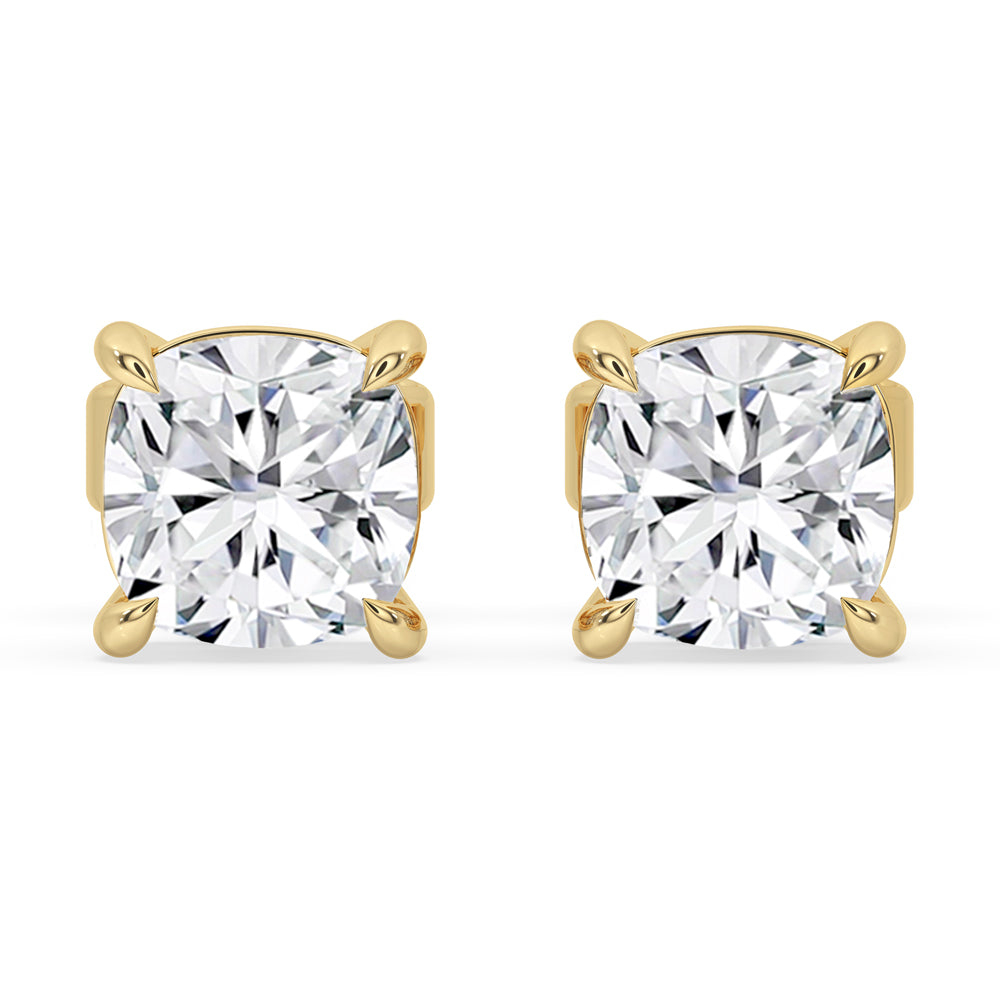 Prong setting earrings showcasing cushion cut diamond studs.
