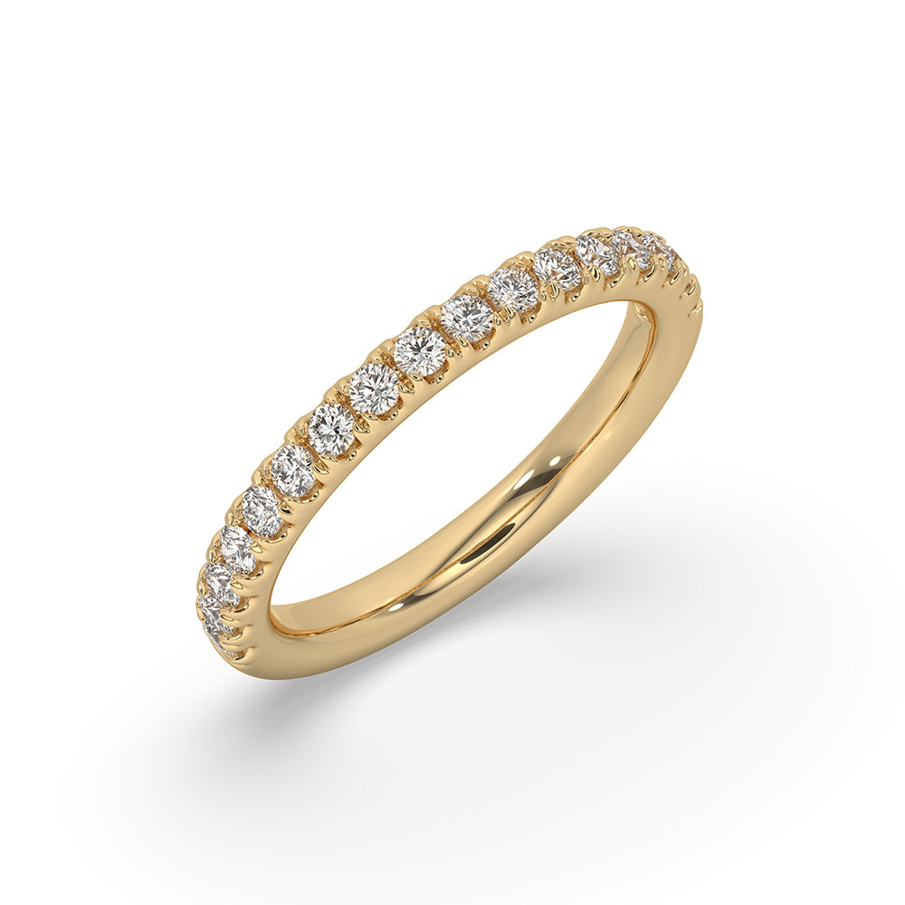 Half eternity band with round diamonds set in a yellow gold wedding band.
