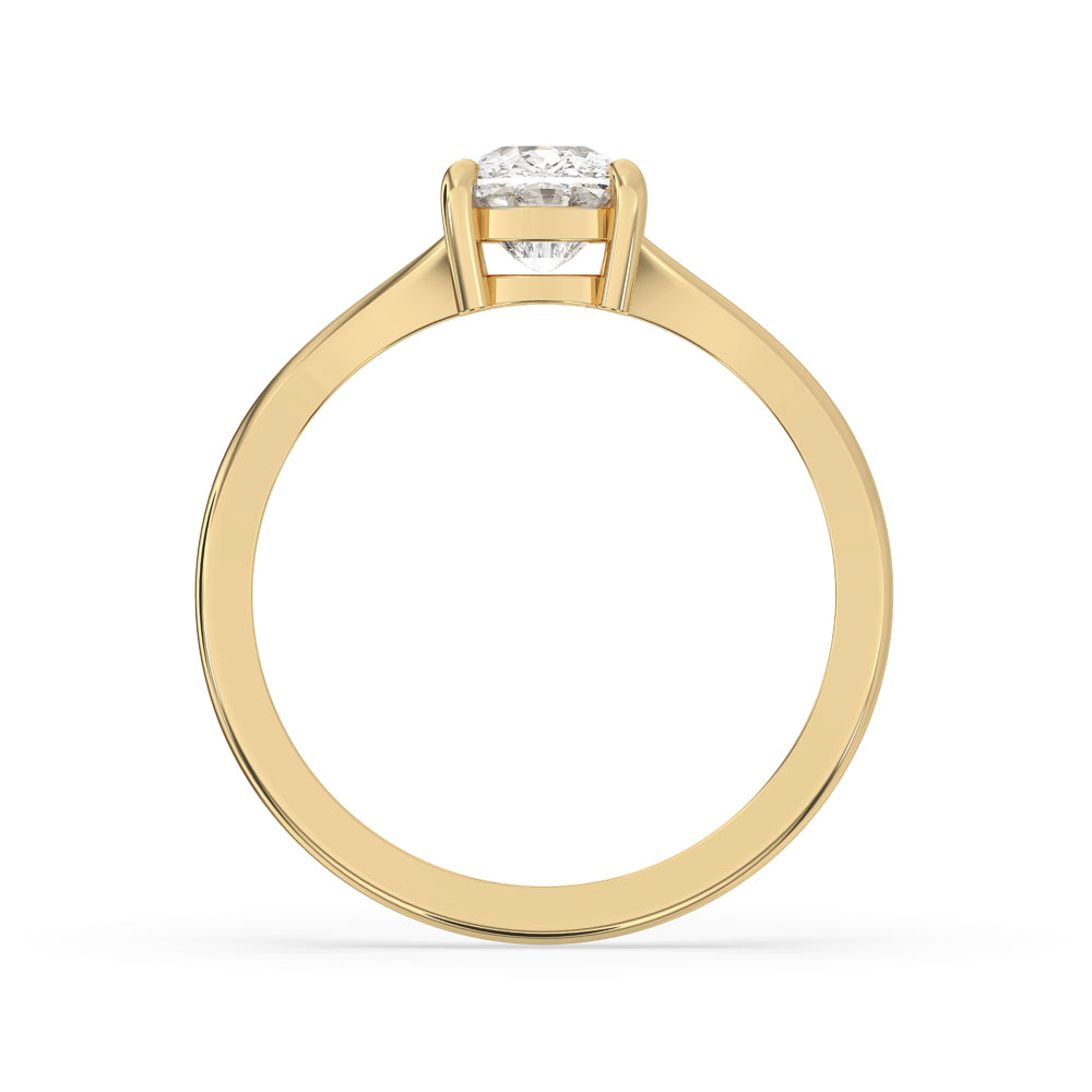 Elongated cushion cut engagement ring with claw prongs and lab-grown diamond for ethical elegance.
