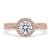 Twisted ring with a unique design, featuring delicate craftsmanship and a stunning diamond centerpiece.