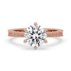 Filigree engagement ring featuring intricate details, perfect for adding vintage charm to your special moments.