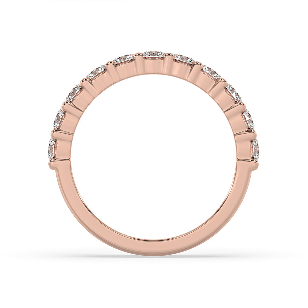 Half eternity wedding band featuring round diamonds for lasting beauty.
