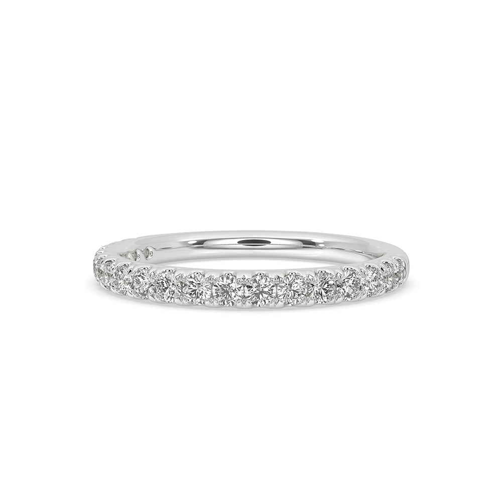 Round diamond wedding band in white gold with elegant design.
