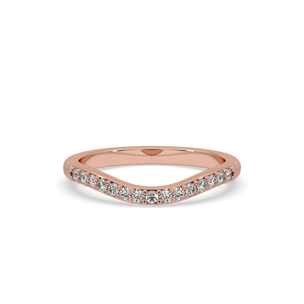 Curved diamond wedding band in gold with a stunning design.
