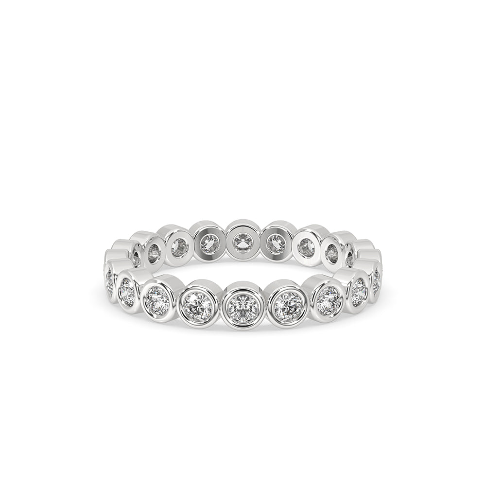 Gold eternity band featuring a stunning round diamond wedding band.
