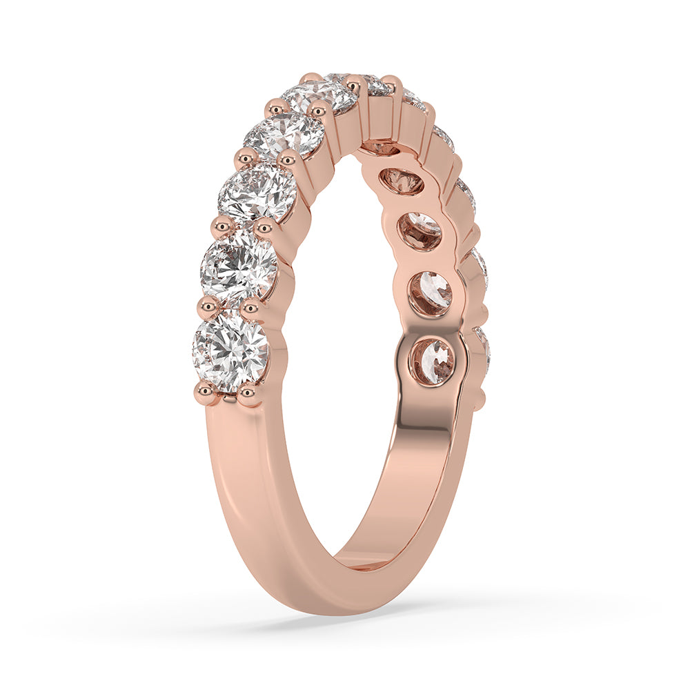 Round diamond band with a stunning rose gold band for added elegance.
