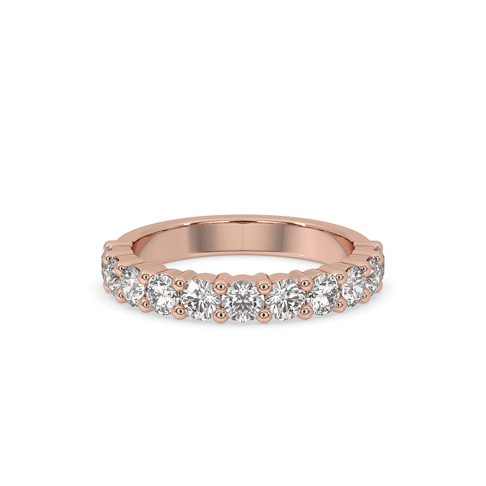 Round diamond eternity band with a stunning round diamond wedding band design.
