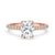 Elongated cushion cut engagement ring with hidden halo.
