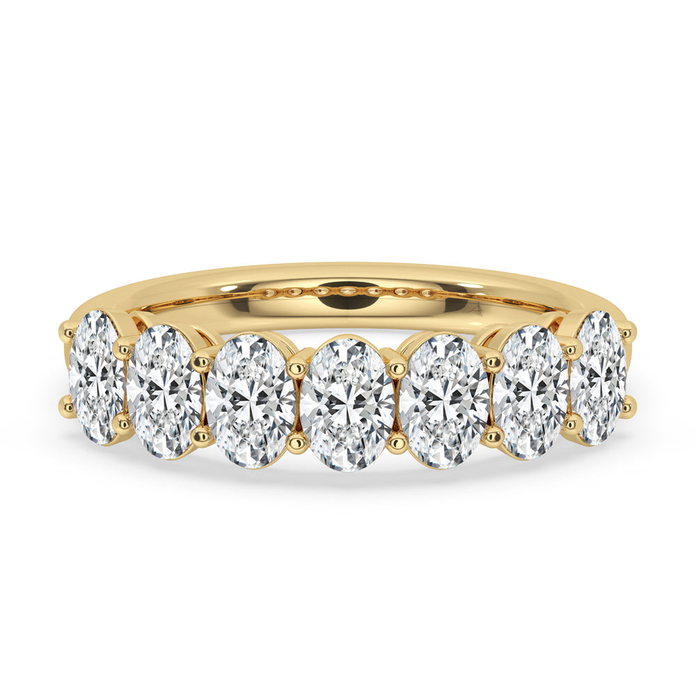 Oval wedding band crafted with lab grown oval diamond in gold.
